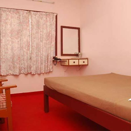 Gps Hotell Kodaikanal Rom bilde