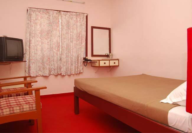 Gps Hotell Kodaikanal Rom bilde